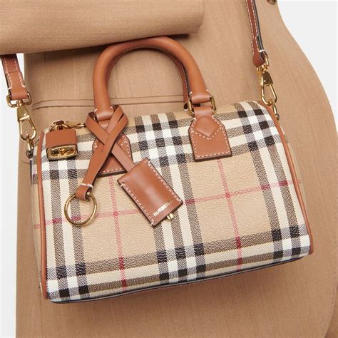 burberry wristlet replica|how to tell if burberry bag is real.